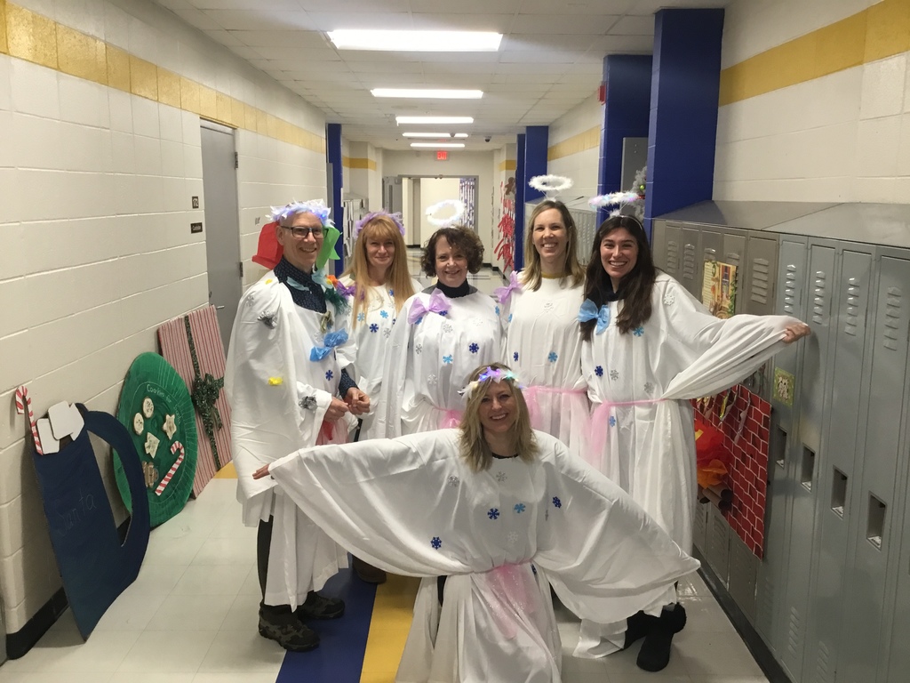 3rd Grade Staff parade with holiday/winter inspired costumes. 