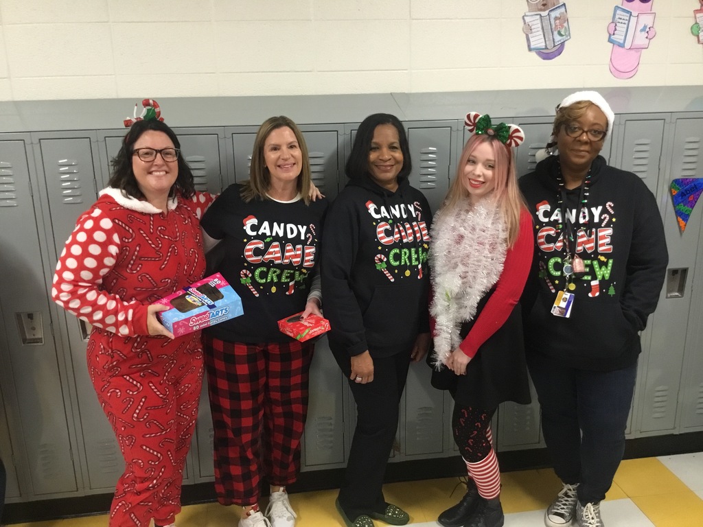4th Grade Staff parade with holiday/winter inspired costumes. 